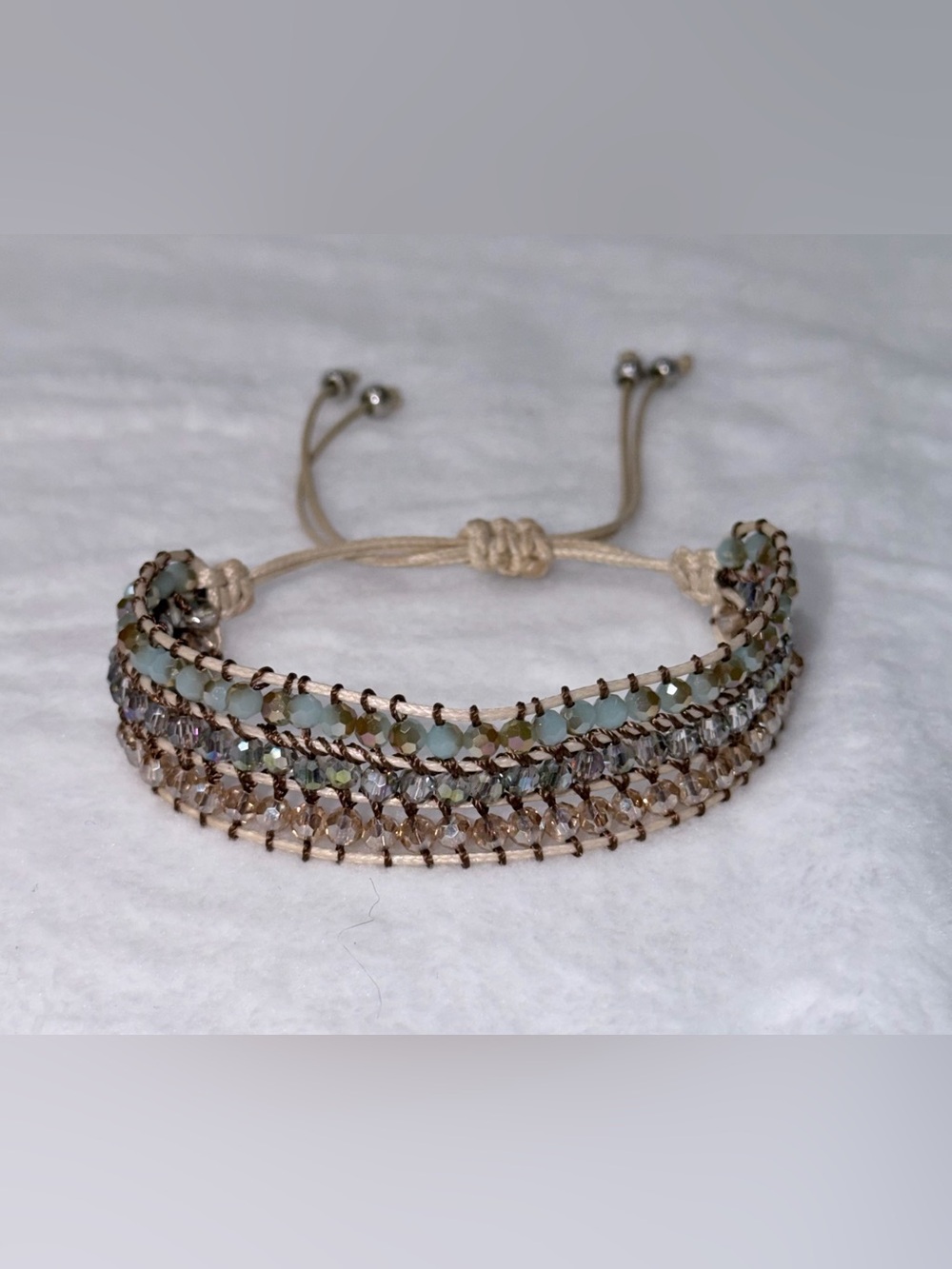 Handcrafted multi strand macrame bracelet w/ neutral colors & adjustable cord